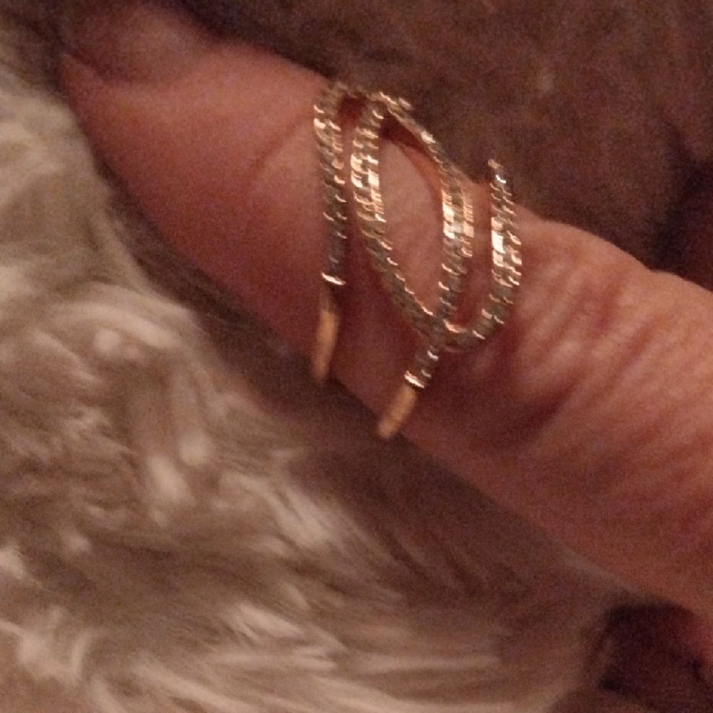 Gold and Silver Stacked Rings with Twisted Design